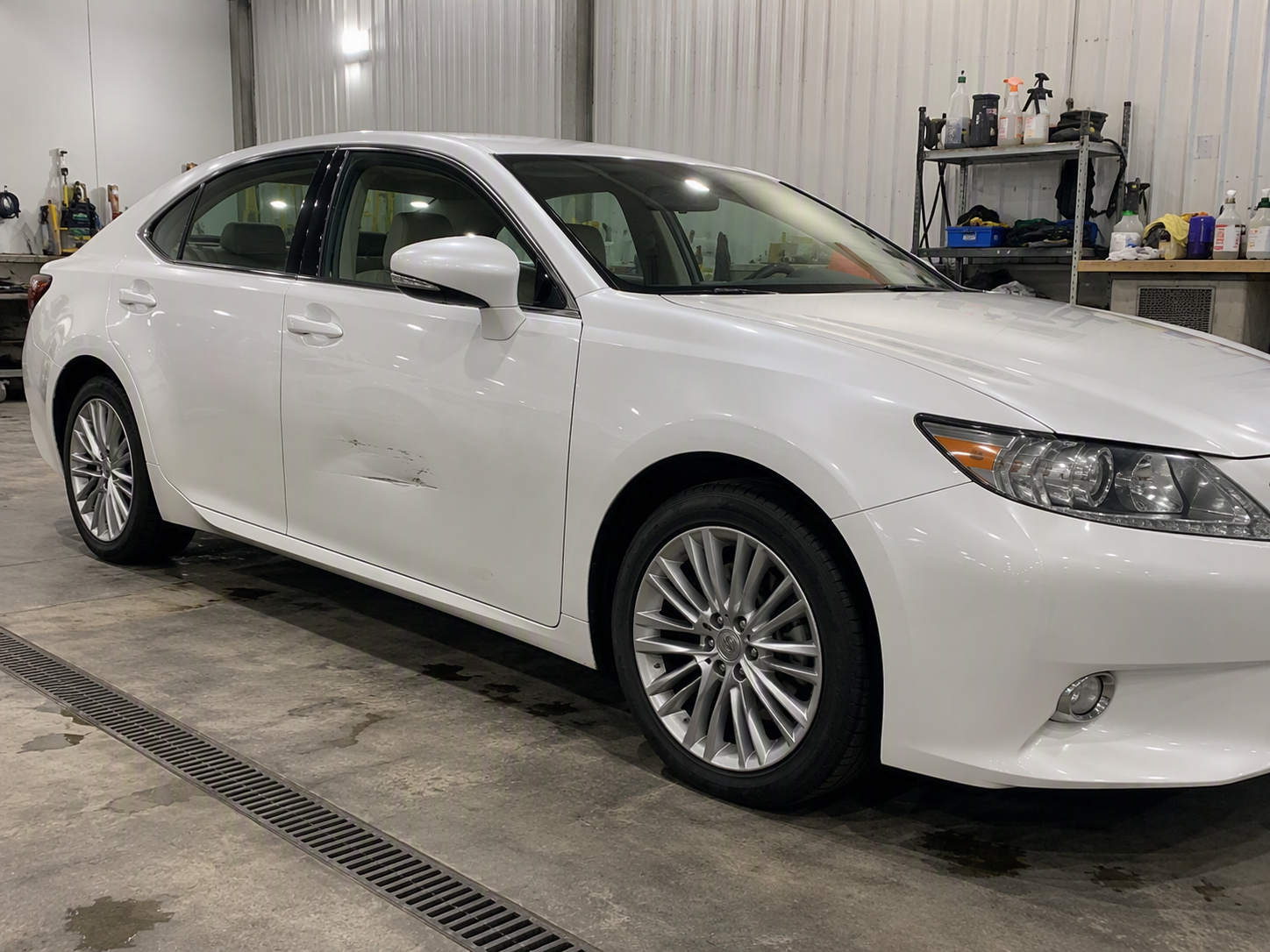 Before · Lexus front door damage
